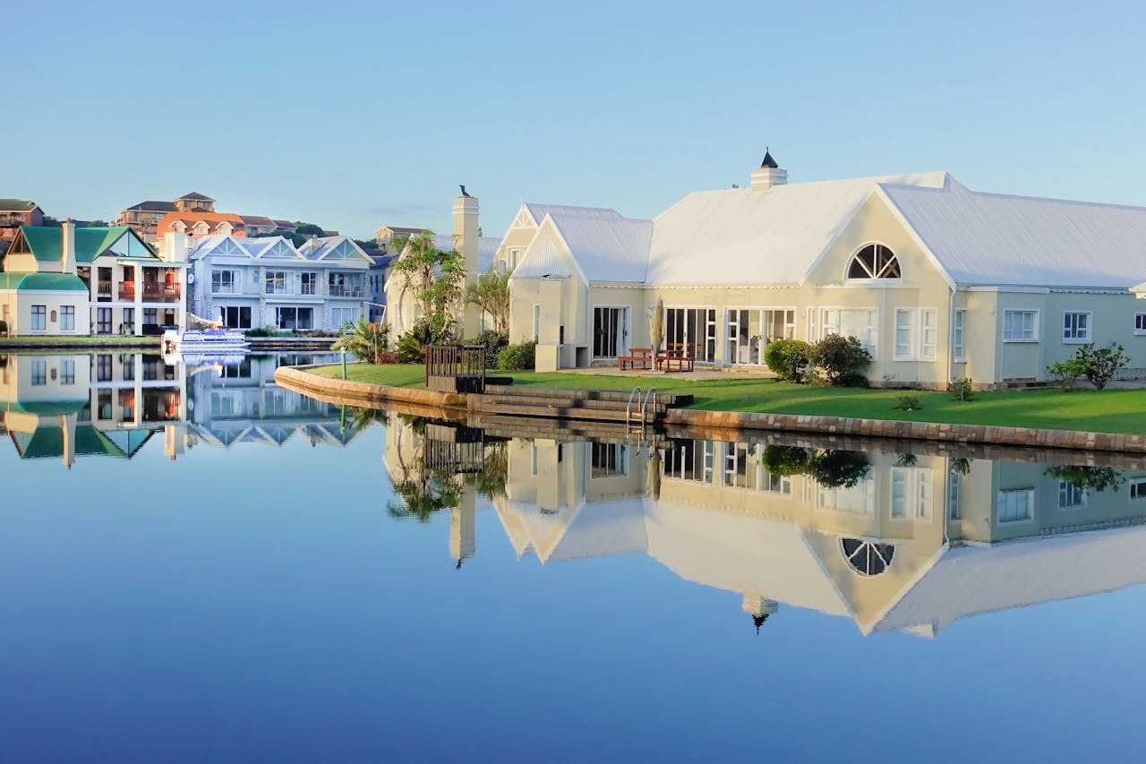 mansion in front of river